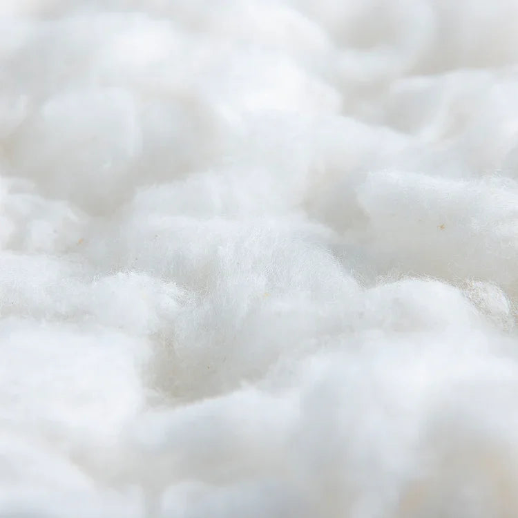 imagem de flocos de algodão representando o toque suave e aconchegante quanto o das plumas de ganso, nosso Pillow Top Magnum AirFiber foi projetado para entregar luxuosidade e conforto supremo.